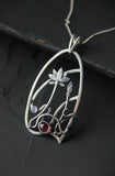 Rhodolite silver pendant with lotus flower