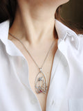 Rhodolite silver pendant with lotus flower