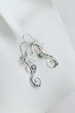 Seahorse silver earrings with topaz