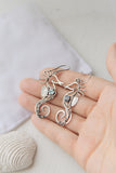 Seahorse silver earrings with topaz