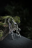 Silver twig earrings with gems