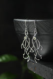 Silver twig earrings with gems