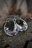 Hoop earrings with ferns and gems
