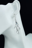 Silver twig earrings with gems